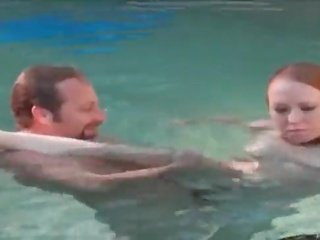 Redhead hottie eats member underwater for awis
